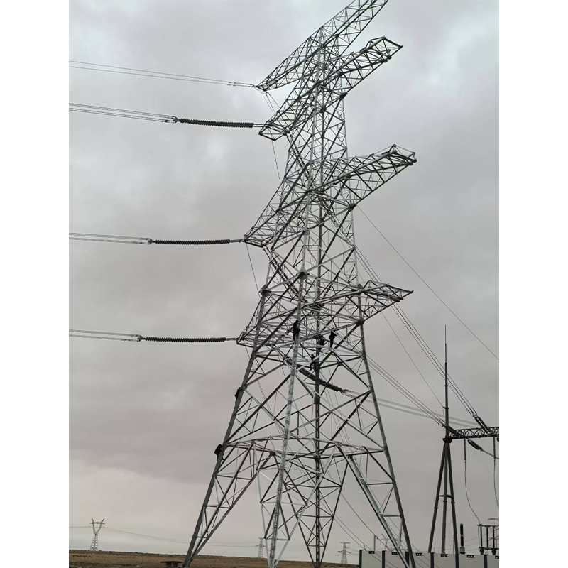 How can transmission line towers improve on-site assembly efficiency and construction safety?