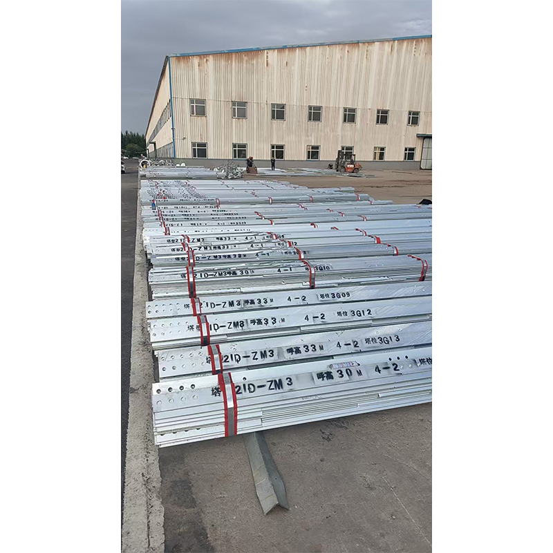 How do transmission line towers ensure the stability and safety of the power grid's lifeline under extreme natural conditions?